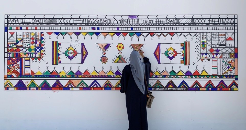 فن القَطّ العسيري